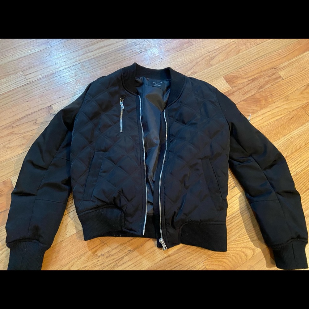 Black bomber jacket.